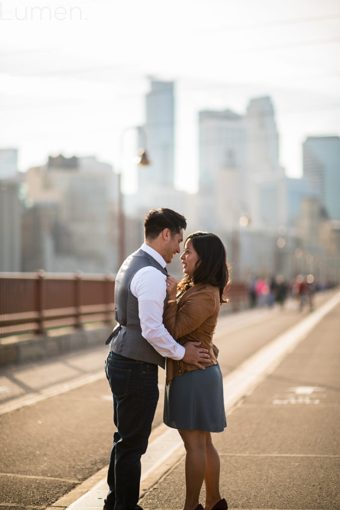 lumen photography, stone arch bridge engagement photos, minneapolis, minnesota, runyon, biking engagement photos, adventurous