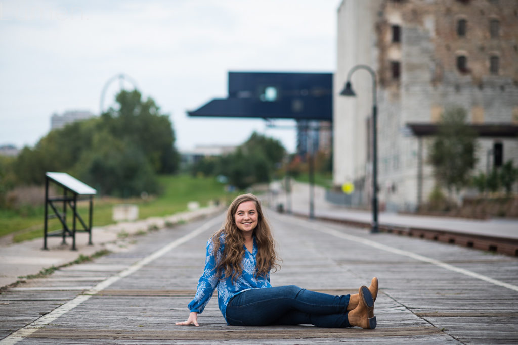 lumen photography, adventurous, minneapolis senior photos, minnesota, stone arch bridge, mill city, senior portraits